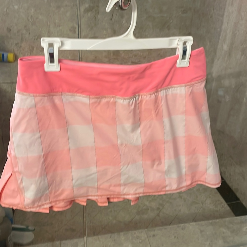 Lululemon coral plaid tennis skirt.